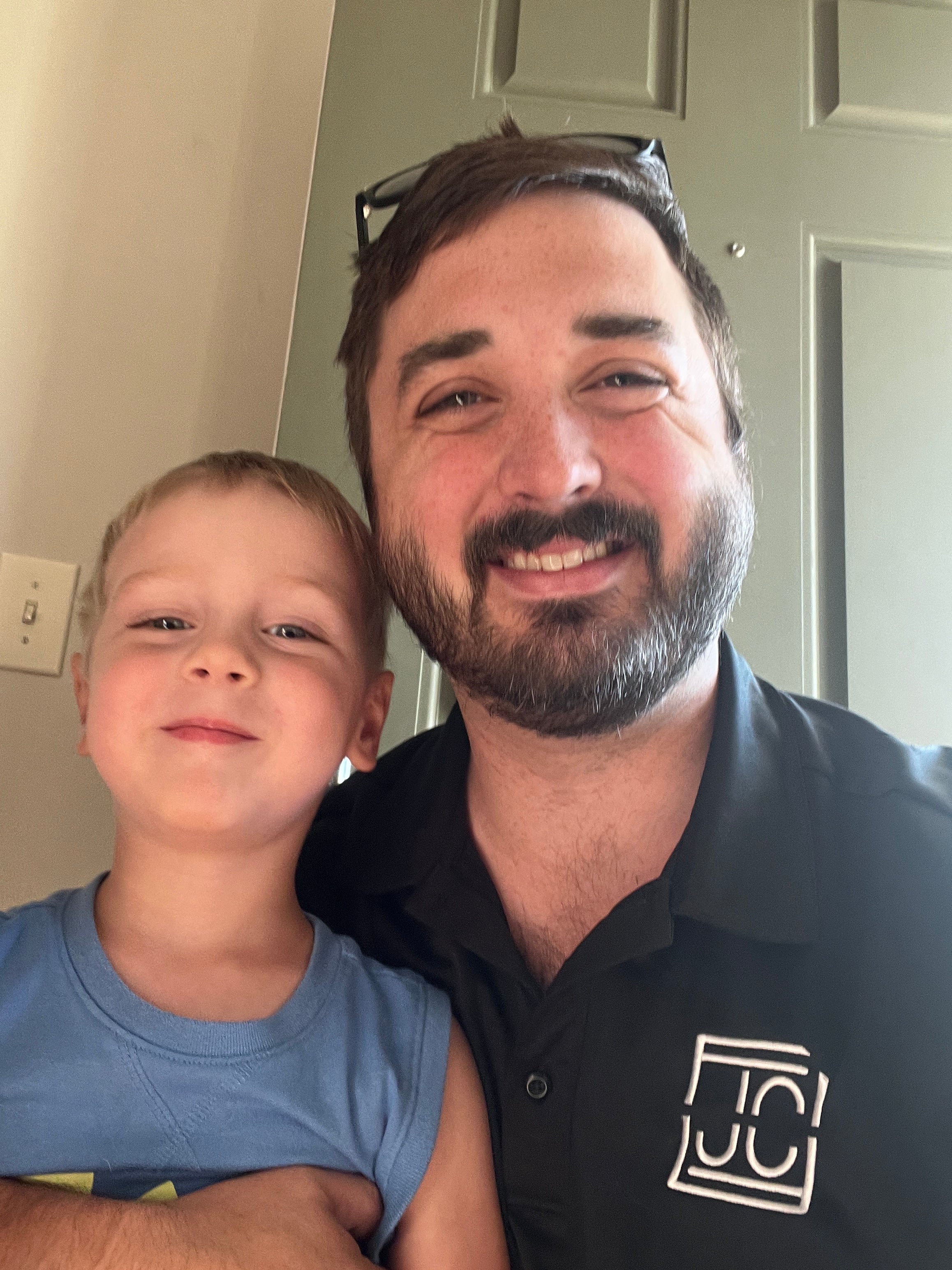 JT, founder of The Bust Vault, with his son in Ohio.